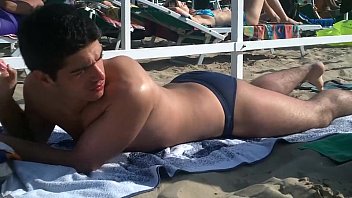 Italian guy teasing on A Riccione s beach in skimpy blue speedos bd24d09695d3929209ed8ae327b87b93.fl