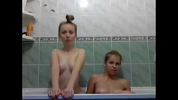 Kinky College Coeds Dawn and Kim Playing in Bath - livesologirls.com