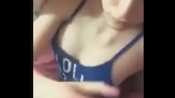 Teen girl undressing in bed